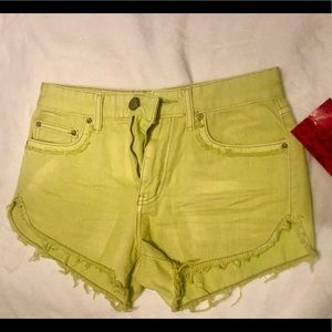 Free people neon green jean shorts